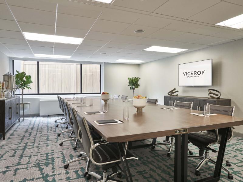A conference table in a bright meeting room at Viceroy Washington DC